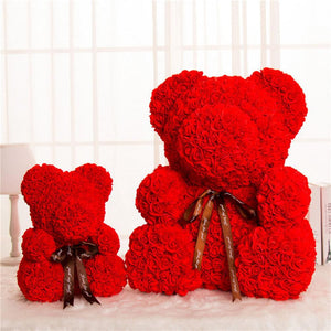 A teddy bear with a red rose symbolises love and affection.