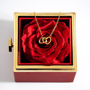 Real Preserved Rose in a rotating jewelry Box With Engraved Necklace inside, for sale and on display