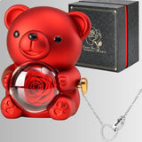 closeup of the red preserved rose teddy bear jewelry box with its giftbox and the necklace